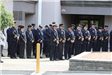 Individuals in uniform lined up during the Memorial Day service