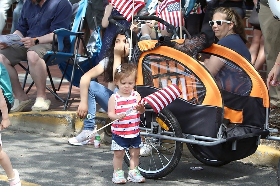 Little girl holding an American flag